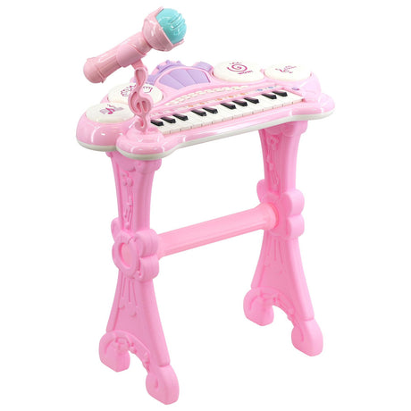 A pink, electronic keyboard toy with a built-in microphone, featuring a pink and white design, a key-tuner and a music stand, designed for children to learn and play music. - UKBuyZone