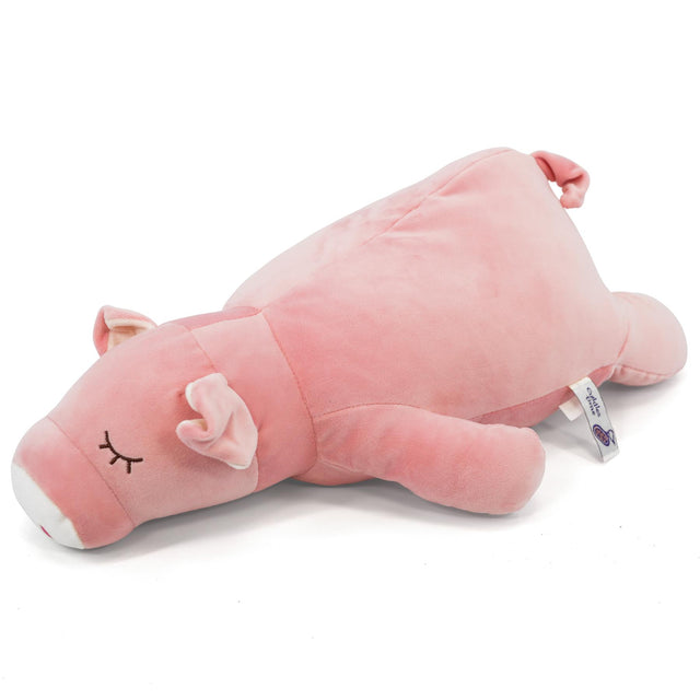 Pink stuffed pig on a white background.