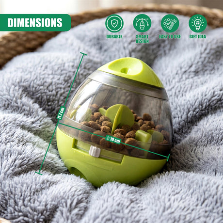 Lime green pet toy dispenser with a clear dome holds pet kibble. Dimensions are marked on the sides.