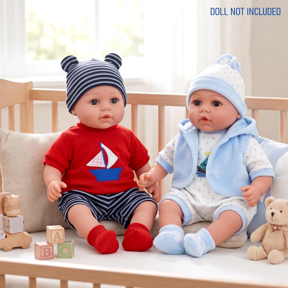 Two dolls wear matching outfits; one features red and blue; the second wears light blue.