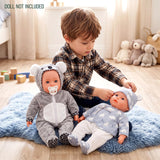 Two dolls wear animal-themed outfits, including polar bear and blue patterned clothing.