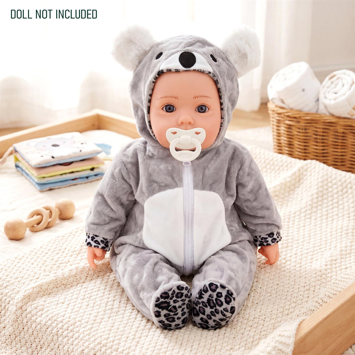 Gray hooded sleeper outfit for dolls, featuring polar bear ears, a central zipper, and gray fabric.
