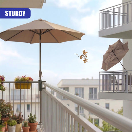 Beige patio umbrellas and planters are visible on a modern outdoor balcony overlooking buildings.