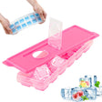 Pink silicone mold and blue insert shown with several clear ice cubes.