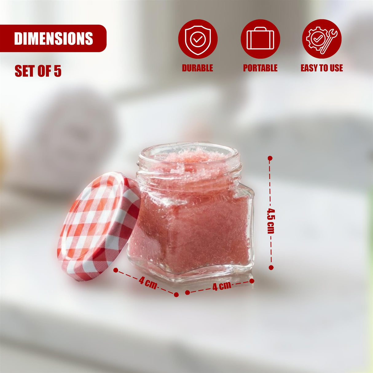 Small square glass jar containing pink product, shown with a red checkered lid and dimension overlays.
