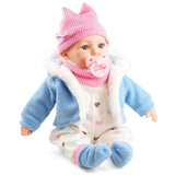 A small baby doll with pink hat.