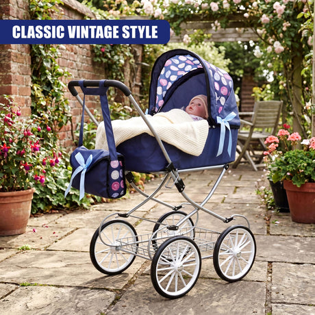 Blue doll pram with a canopy and matching blue bag sits on a metal frame.
