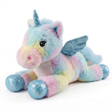 Pastel unicorn plush toy with blue wings, rainbow body, and a horn.