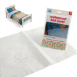 A single bed set with a patterned cover, packaged waterproof cover, and a plain white sheet.