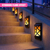 Lantern-style LED lights are mounted into the wall next to concrete outdoor steps and railing.