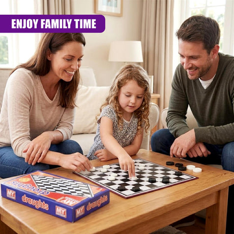 Boxed traditional draughts game set and open folding playing board resting on a wooden table.
