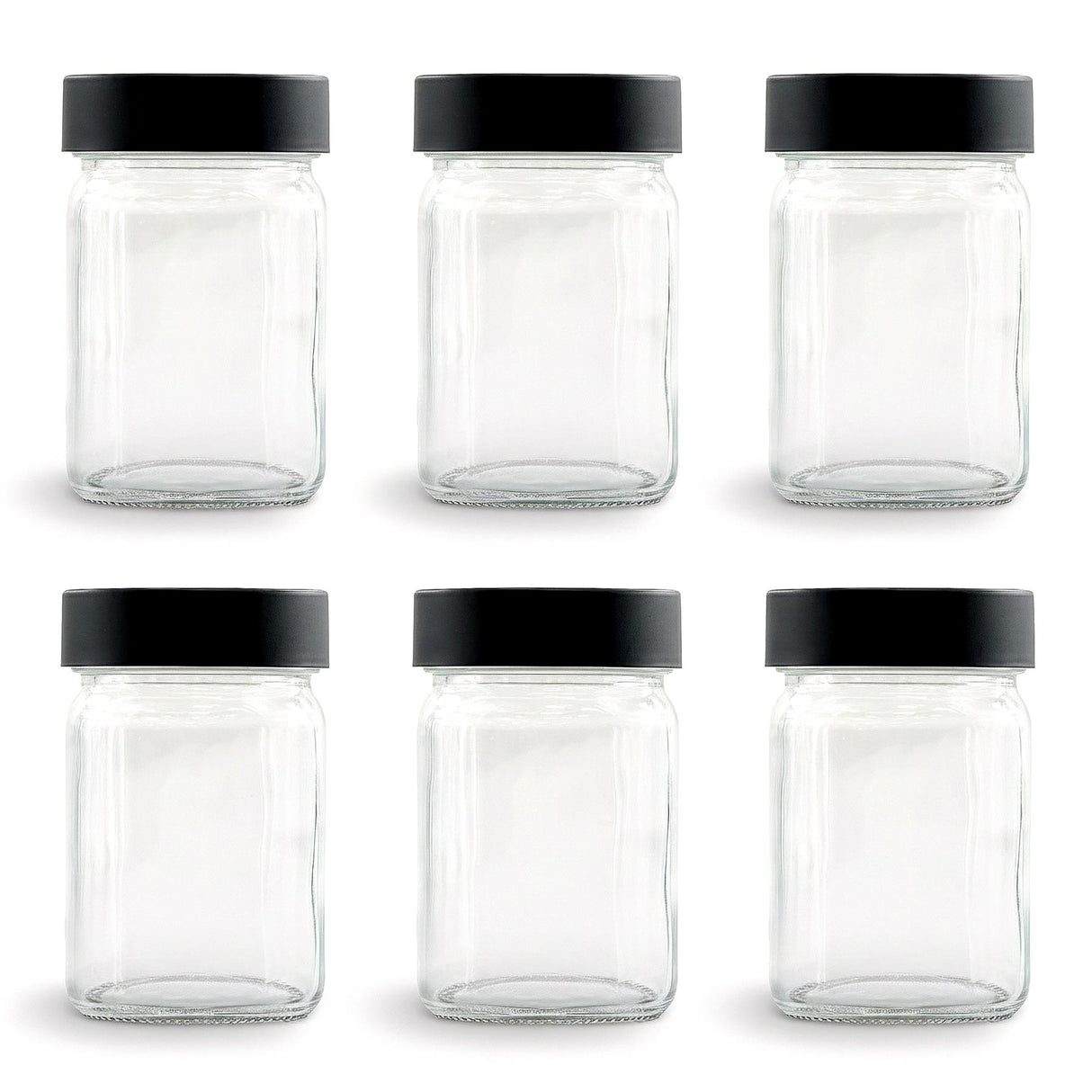 Set of six clear glass spice jars displayed with matching solid black screw-top lids.