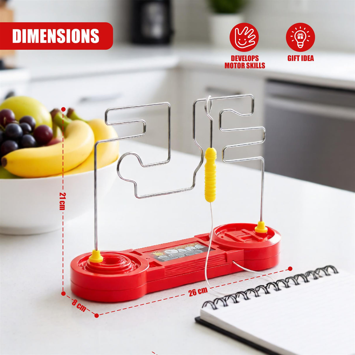 Two metal wire paths and a red electronic base show dimensions for a physical game.