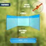 Blue three-panel outdoor shelter featuring adjustable orange guy lines and included portable carrying bag.