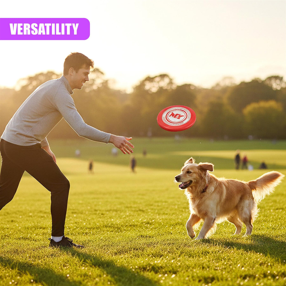 Man throws a red frisbee across a grassy field toward a running dog.