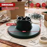 A green adjustable Christmas tree stand by GEEZY sits on a white cloth with packaging and lights nearby