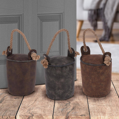 "Three brown and black door stops on display, each one a different size." - UKBuyZone