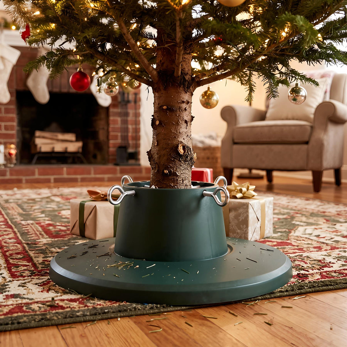 An adjustable Christmas tree stand by GEEZY holding a decorated tree over presents and a fireplace