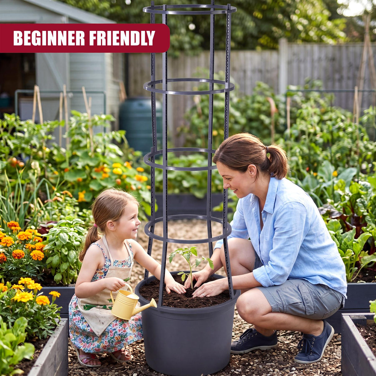 A woman and girl plant tomatoes around a tall, four-tiered black garden pot stand.