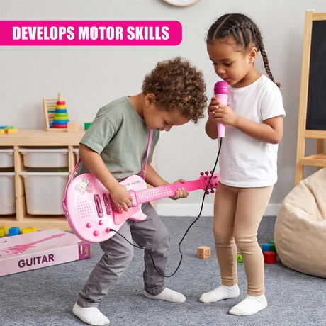 Boy and girl playing music with a pink guitar and microphone inside a playroom.