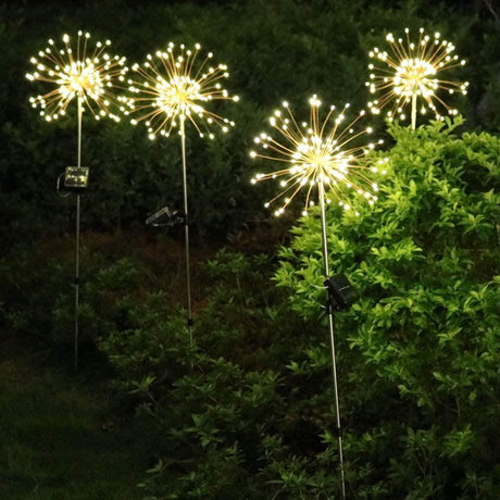 2 pack of starburst solar powered stake lights.