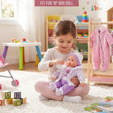 Doll dressed in purple and white clothing sits while a girl feeds it near various colorful toys.