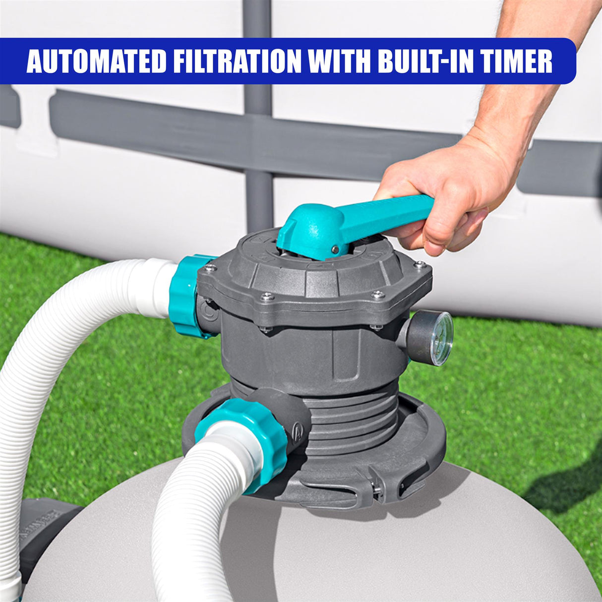 A hand adjusts the blue lever on a gray filtration unit connecting large white intake hoses.