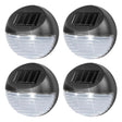 Four exterior solar lights featuring a black body, solar panel, and white LED emitter.