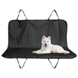 Black cat sitting on black pet seat cover. - UKBuyZone