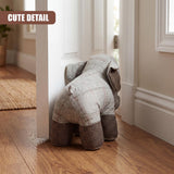 Plush elephant door stopper with a gray tweed body and patterned brown feet.