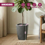 A gray, ribbed flower pot sized 43 by 28.9 cm holding a potted houseplant in an indoor setting.