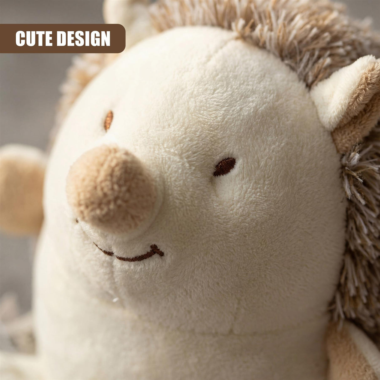Plush toy hedgehog door stopper featuring a light brown snout and soft, textured fabric.