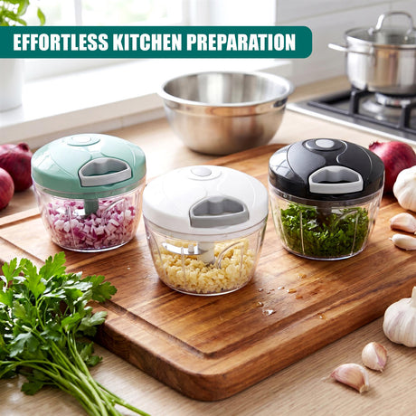 Three food choppers filled with chopped vegetables and herbs sit on a wooden cutting board.