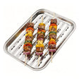 Grilled skewers of meat and vegetables rest on a rectangular, perforated metal grill tray.