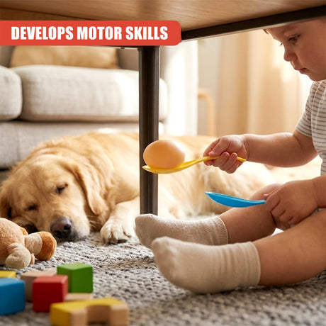 A toddler holds a yellow spoon with an egg near a sleeping golden retriever.