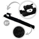 A novelty black cat draught excluder, measuring 31 inches, featuring a fluffy texture and a cute cat face at one end. The excluder is positioned horizontally, showcasing its length and soft material.