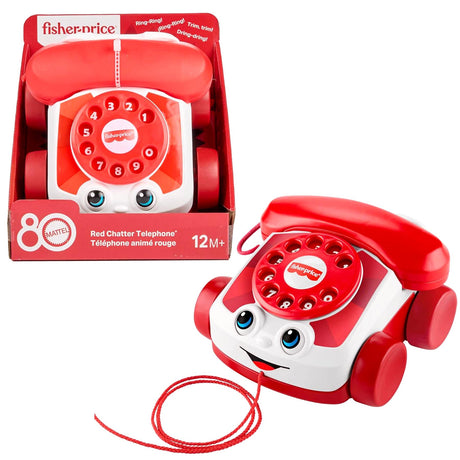 Fisher-Price red telephone toy featuring a rotary dial and an expressive plastic face.