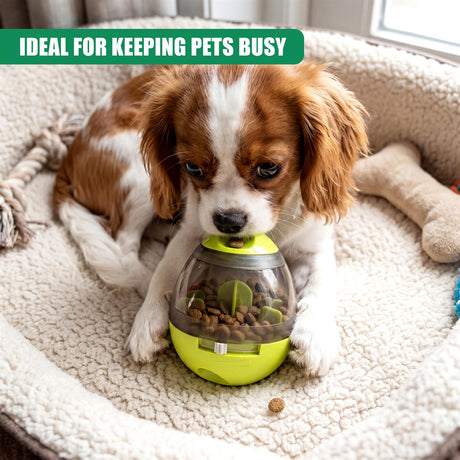 Beagle dog sniffing a yellow treat dispensing toy filled with kibble on a white bed.