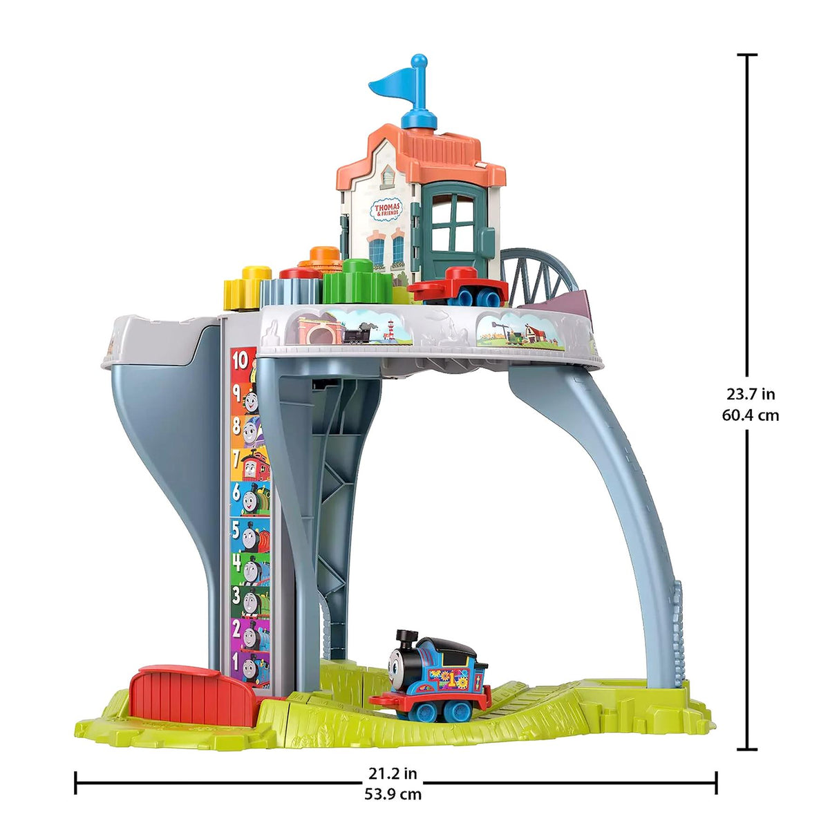 Wooden playset featuring a station structure, toy train tracks, and plastic locomotive toys.