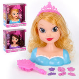 Blonde vinyl doll head wearing pink crown, paired with combs and two boxed styling accessory sets.