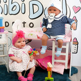 "BiBi Furniture's adorable doll bunk bed with pink walls, two small dolls sitting on it." - UKBuyZone