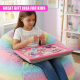 Young girl crafting with beads on a pink, beaded lap tray and cushion.