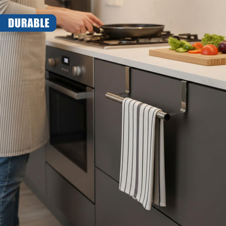 Metal towel rail installed on a kitchen cabinet, holding two striped hanging tea towels.