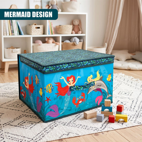 A blue mermaid-themed storage box with a lid, surrounded by wooden blocks on a patterned rug in a child's room