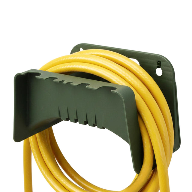 Dark green hose holder mounted on a wall, positioned above a coiled yellow garden hose.