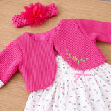 Pink knitted doll tops, a floral headband, and white polka dot dress set are displayed.
