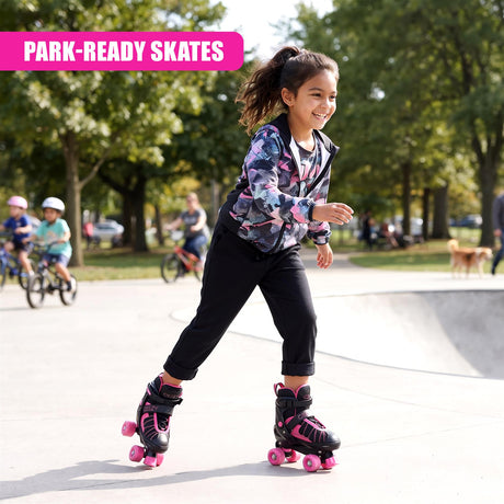 A smiling girl wearing a patterned jacket and black trousers skates on a concrete park surface in roller skates with pink