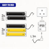 Diagram showing a battery eliminator for 2 or 3 AA/AAA batteries connected to a UK mains socket via a 3-metre cable