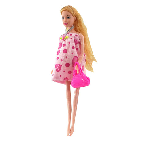 Pregnant blonde doll wearing a pink polka-dot maternity dress and carrying a matching purse.