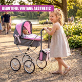 Little girl standing next to a grey and pink doll's pram in a grassy outdoor setting.